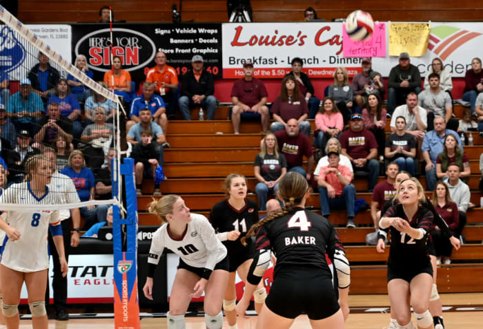 Baker senior Lily Adams (12) sets up a shot during the state Class 1A state championship match against Brandford at the FHSAA girls volleyball championships Tuesday at Polk State College in Winter Haven.